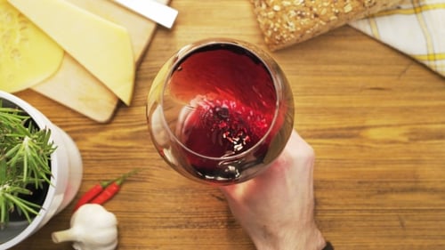 Swirling Red Wine Glass Overhead Still Life