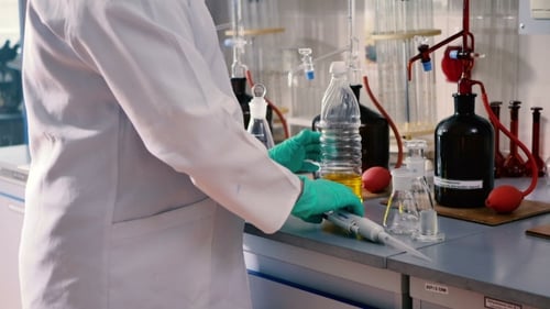Scientist Conducts Scientific Experiments in the Lab