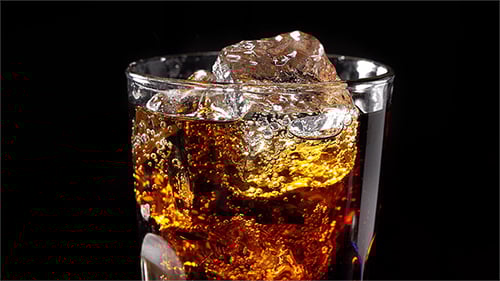 Refreshing Cola with Ice in a Glass