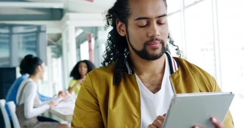 Male creative working in a modern office