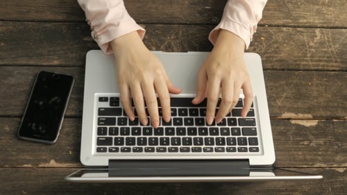 Typing on a Laptop at Work, Overhead View