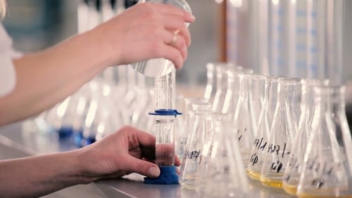 The Volumetric Flask Is Poured Into a Liquid.