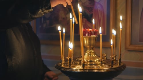 Burning Candles in an Orthodox Church. Icons and Prayer.