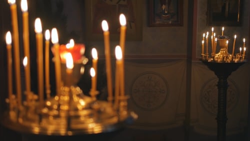 Burning Candles in an Orthodox Church. Icons and Prayer.