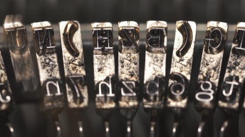 Close Up of Vintage Typewriter Letter Stamps