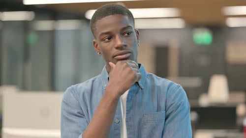 Pensive Young African American Man Thinking