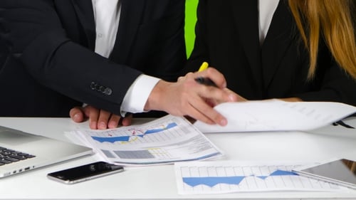 Business People Analyze Data in Modern Workplace