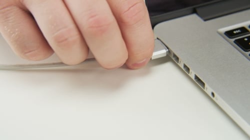 Plugging USB Cables into a Laptop Computer Port