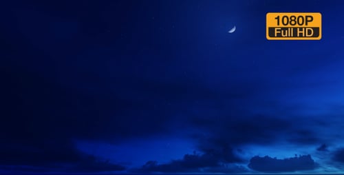 Deep Blue Night Sky with Moving Clouds and Crescent Moon