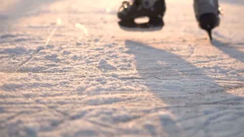 Kids Ice Skating on Frozen Lake