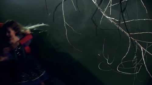 Child in Dress Standing in Dark, Smoke