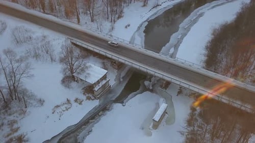 Car On Winter Bridge