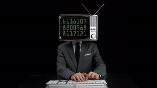 Person Typing with TV Head on Black Background