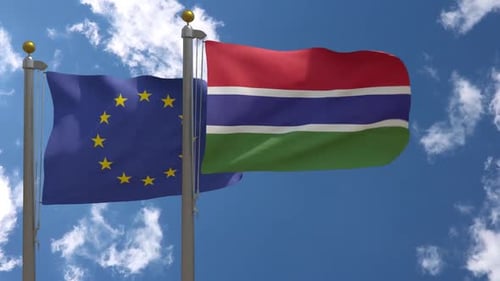 European Union and Gambia Flags Waving Symbol of Cooperation