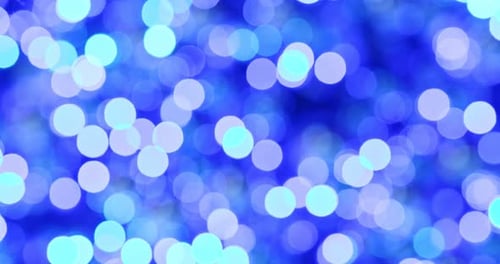 Abstract Festive Background with Blue Bokeh Lights