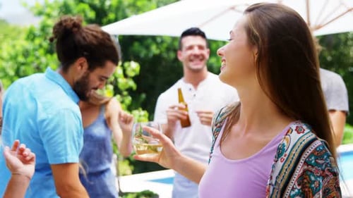 Friends Enjoying Backyard Barbecue Party Together