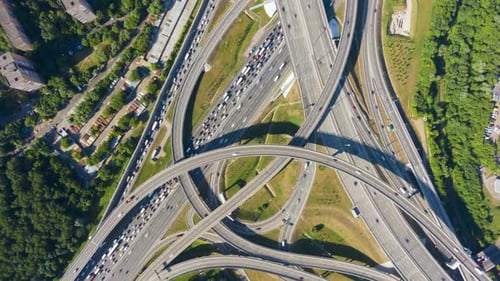 Road Junction and Cars Traffic in Summer Day. Flyover. Aerial Top-Down View