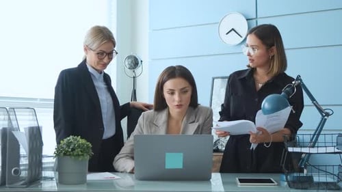 Women Collaborating on a Project in the Office