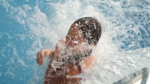 Close-up Young Woman Relaxing with Hydromassage, Looking at the Camera and Smiling, Enjoying the