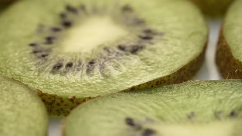 Kiwi Slices Closeup, Macro Food Summer Background, Fruits Top View. Rotate