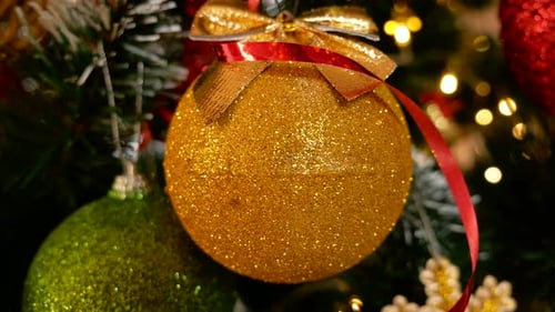 Glittery Gold Bauble on Christmas Tree