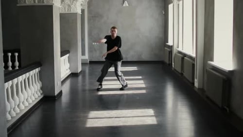 Young Adult Dancing in a Modern Room