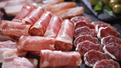 Restaurant Meat Platter (Ham, Salami, Bacon) on the Black Stone Tray