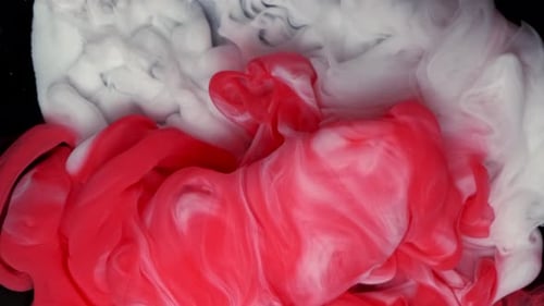 Red and White Ink Cloud Mixing Abstractly
