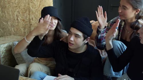 A School Children Group Studying at Home Happily Highfive Each Other