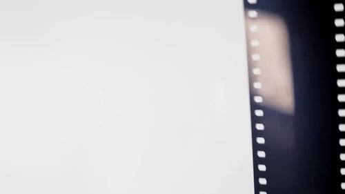 Retro Film Strip Horizontal Transition with Light Leaks