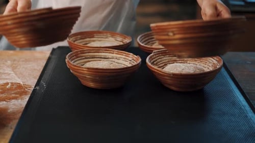 Man kneading dough with his hands to make bread