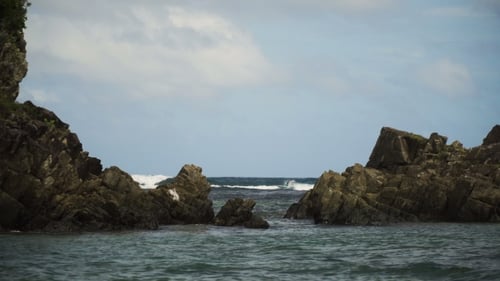 Surfers on the waves.Catanduanes, Philippines.