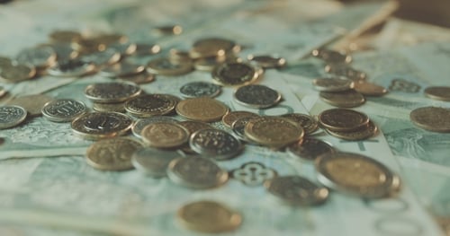 Close Up of Coins and Banknotes Money