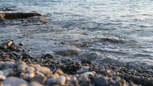 Waves Crashing on Rocky Beach Shoreline