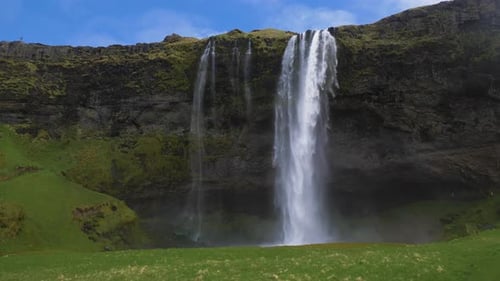 Seljalandsfoss Waterfall and Green Landscape. Iceland