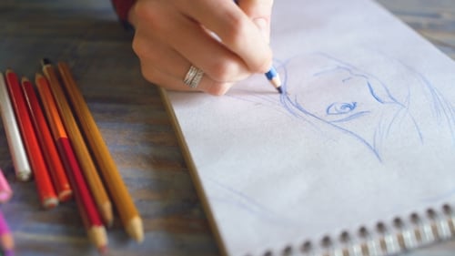 Hand Drawing Portrait with Blue Colored Pencil