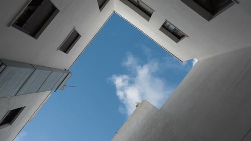 Inside Close Yard. Look at Up. Bottom View. Fast Clouds. .
