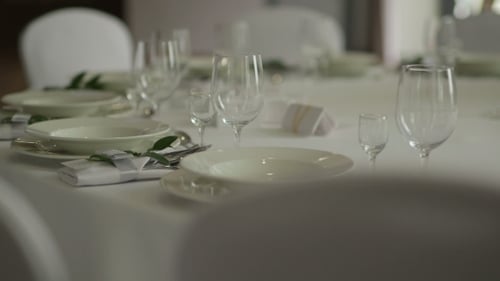 Elegant Tableware Arrangement on a Banquet Table