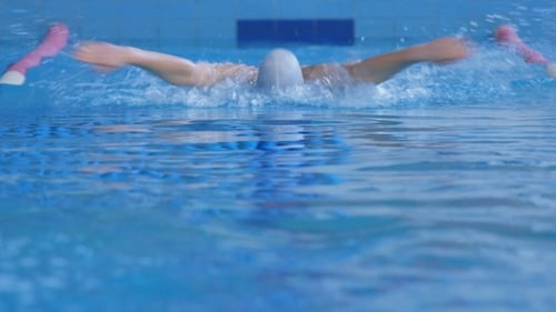Professional Swimmer Performing