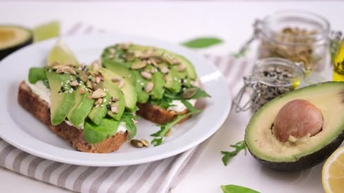 Avocado Toasts with Seeds and Fresh Ingredients