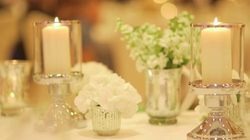 Elegant Wedding Table Decorations with Candles and Flowers