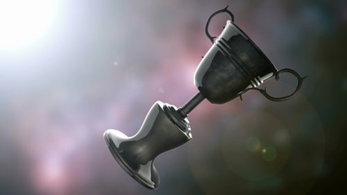 Elegant Spinning Silver Trophy Award on Spotlight Background