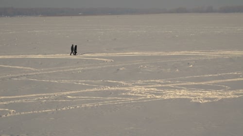 Couple Walking in the Snow