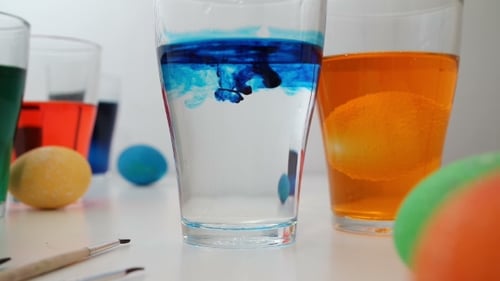 Dying Easter Eggs with Colorful Dye and Paint