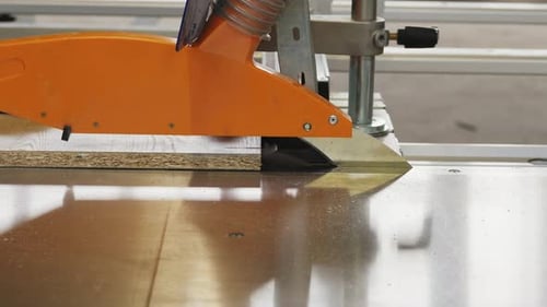 Closeup Process of Carpenter Worker with Circular Saw Machine