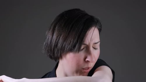 Woman Coughing and Showing Various Facial Expressions