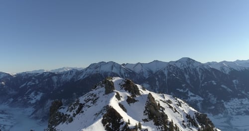 Flying Over the Top of the Mountain with a Cross