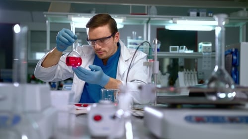Serious Scientist Working Diligently in a Lab