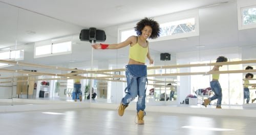 Adorable African American Girl Dancing in Studio