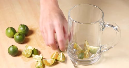 Preparing Calamansi Lime Soda Water Beverage